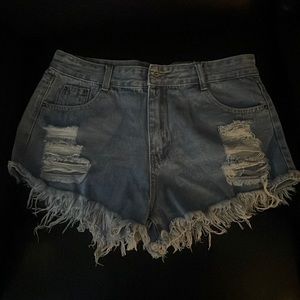 Light blue distressed Jean shorts size 44. Purchased from Shein.